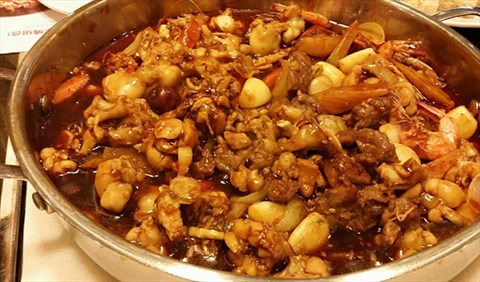 焖牛蛙 - 西单的黄记煌三汁焖锅)