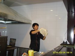 抛饼小哥儿